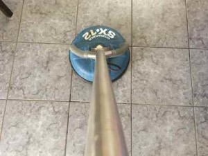 Tile cleaning machine on tiled floor